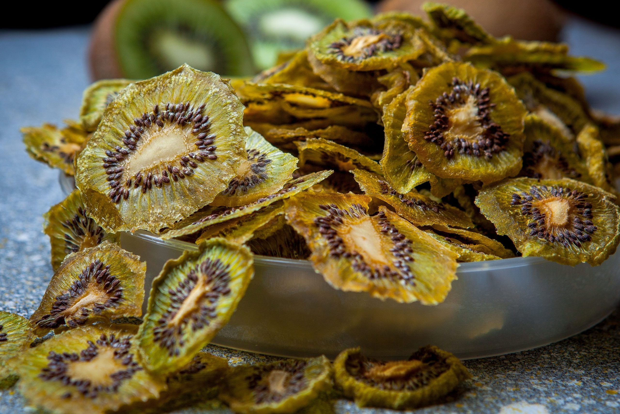 Dried kiwi fruit on stone table horizontal
